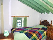 Rural accommodation: Green bedroom Rural accommodation with two bedrooms, Comares, Malaga